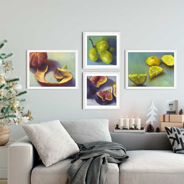 Four Christmas food art prints on a living room wall with an elegant Christmas display. They add a touch of elegance to your seasonal decor in the kitchen, dining room gallery or home bar.