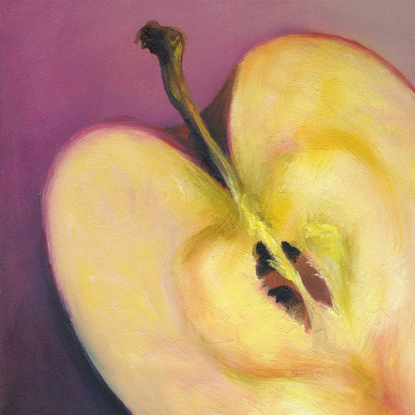 A cream yellow apple on a rose pink background, cut to show the subtle heart at the core. This is an archival giclee print of my realistic oil painting fruit still life. The original artwork is sold.