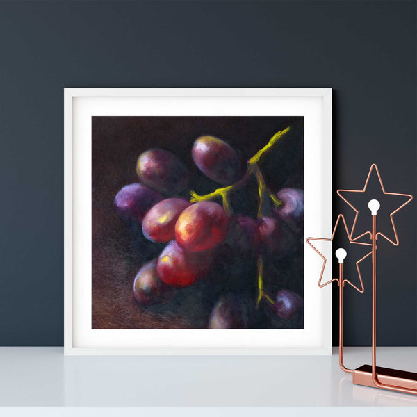Dark purple grapes oil painting art print, in an elegant white picture frame on a dining room or living room wall, with elegant modern holiday decor.