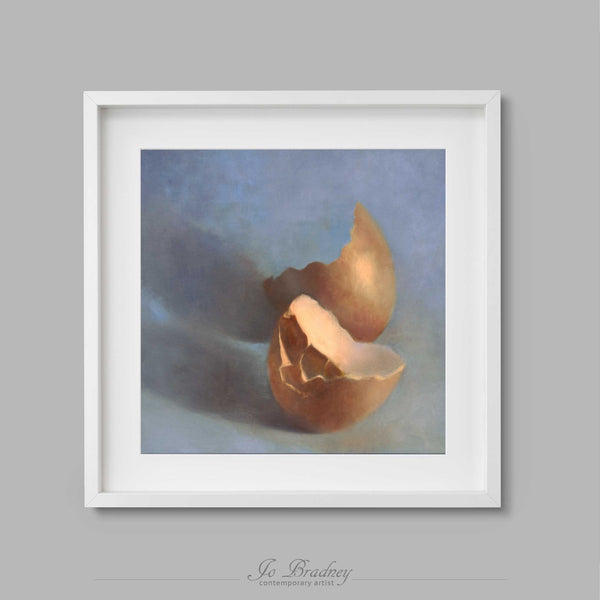 A warm brown eggshell on a delicate cool blue background. This archival art print of my food still life oil painting is shown in simple white picture frame.