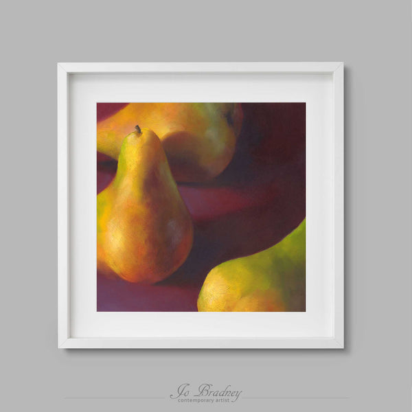 Warm yellow fall pears on a burgundy background. This archival art print of my fruit still life oil painting is shown in simple white picture frame.