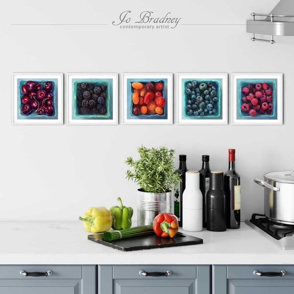 a kitchen wall art gallery created with 5 of my square fruit still life paintings