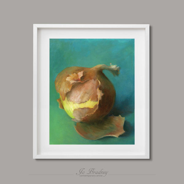 A warm yellow and brown onion on a bright green turquoise background. This archival art print of my vegetable still life oil painting is shown in simple white picture frame.